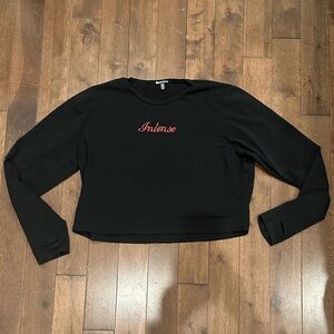 Horoscopez by Dolls Kill black “Intense” long sleeve crop top